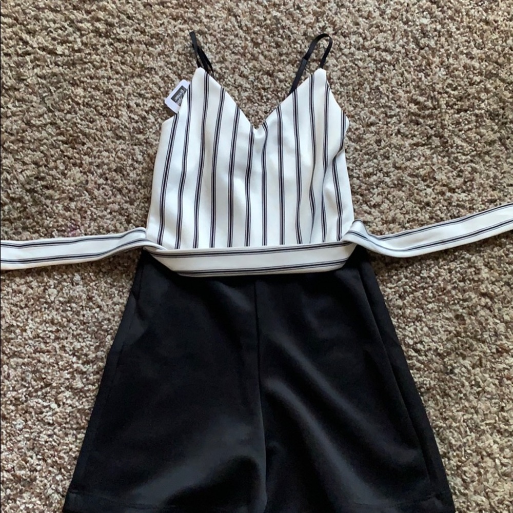 Size small short black and white Striped romper